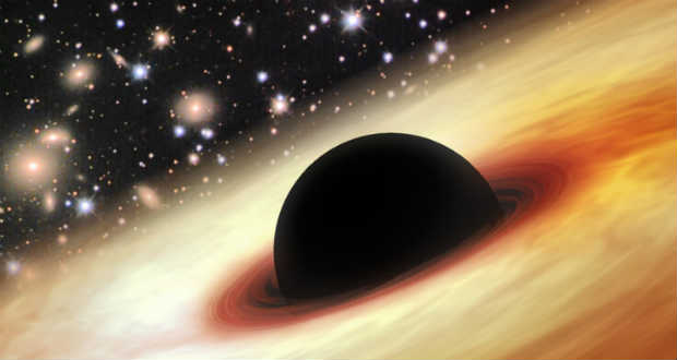 Túlméretezett fekete lyuk uralja egy ősöreg galaxis centrumát