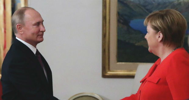 Részletes megbeszélést folytatott Merkel és Putyin